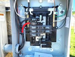 Electrical service panel that feeds power to run the digital message board, the signs and accent lighting