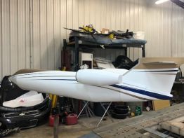 The Suny1 - a custom fabricated aluminum aircraft built by the expert craftsmen on the Sun Sign Company team   for The Greater Portsmouth Regional Airport nearing completion in the paint department
