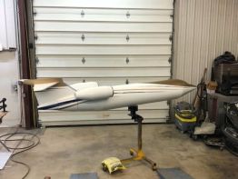 The custom fabricated aluminum aircraft built by Sun Sign Company's team of elite craftsmen  for The Greater Portsmouth Regional Airport nearing completion in the paint department