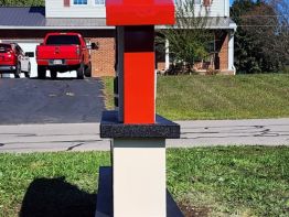 End view of the tiered aluminum Monument Sign built by Sun Sign Company for the entrance to the South Webster, Ohio branch of the Scioto County Public Library