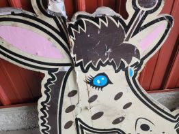 The second of two wooden sign faces that fell made by our competitors