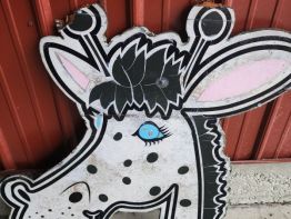 One of two wooden sign faces that fell made by our competitors.