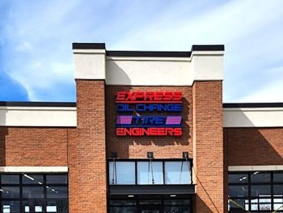 Internally illuminated cabinet sign installed by Sun Sign Company onto building in New Albany, OH